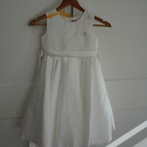 Little girl size 6 white satin dress with appliqué beading